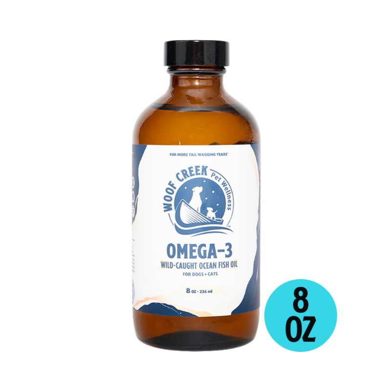 Omega-3 Ocean Fish Oil from Woof Creek Dog Wellness in an 8oz glass bottle, suitable for dogs and cats.