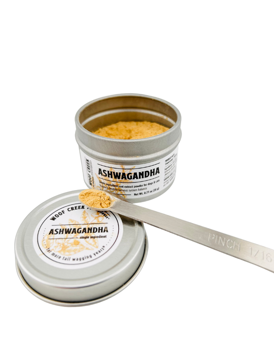 Ashwagandha root extract powder in a container for dogs and cats, a natural superfood supplement from Woof Creek Pet Wellness.