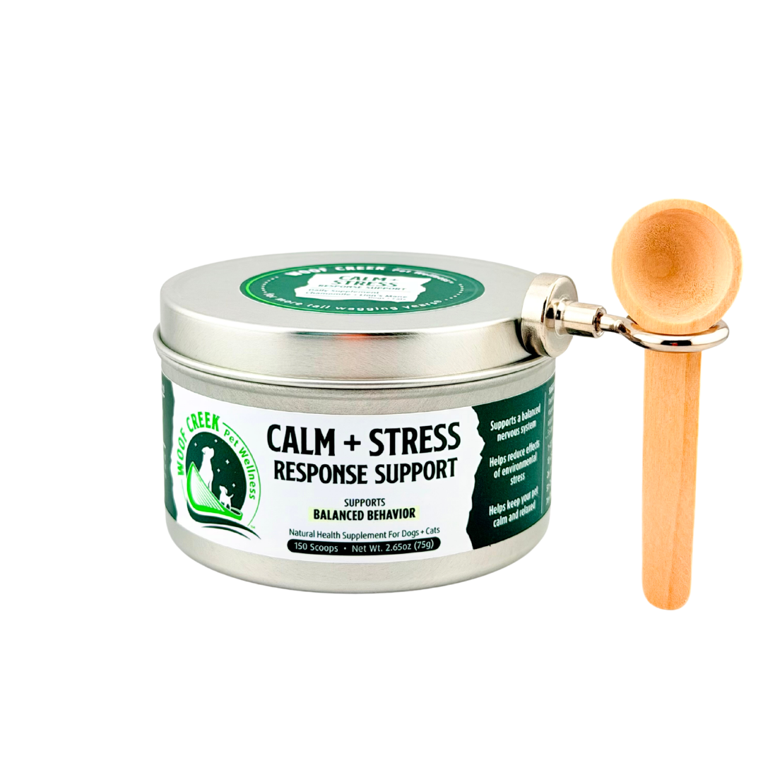 All-natural Calm and Stress Response Support supplement for dogs and cats in a metal tin with a spoon from Woof Creek Pet Wellness.