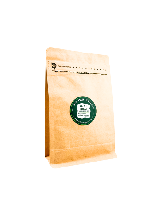 Large refill pouch of Woof Creek Pet Wellness Calm and Stress Response Support dog supplements, shown in a resealable bag.