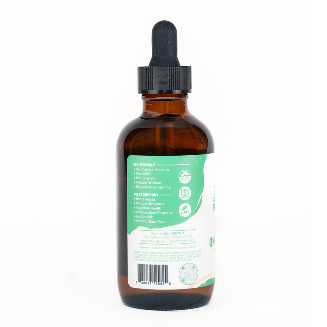 Omega Balance Plant-Based Ahiflower® Oil in a 4oz glass bottle for dogs, a natural pet superfood by Woof Creek Pet Wellness.