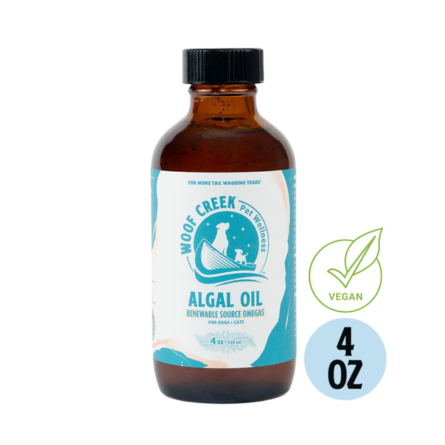 Woof Creek Pet Wellness Algal Omega-3 plant-based oil topper in a 4oz glass bottle, suitable for dogs and cats, pet superfoods.