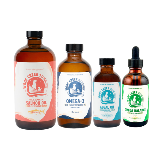 Dog superfoods Omega DHA and EPA oil bundle by Woof Creek Pet Wellness, featuring bottles of omega-rich supplement for dogs.