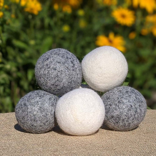 Organic wool dryer balls 3-pack from Zero Waste Outlet, natural laundry accessories for eco-friendly fabric drying.